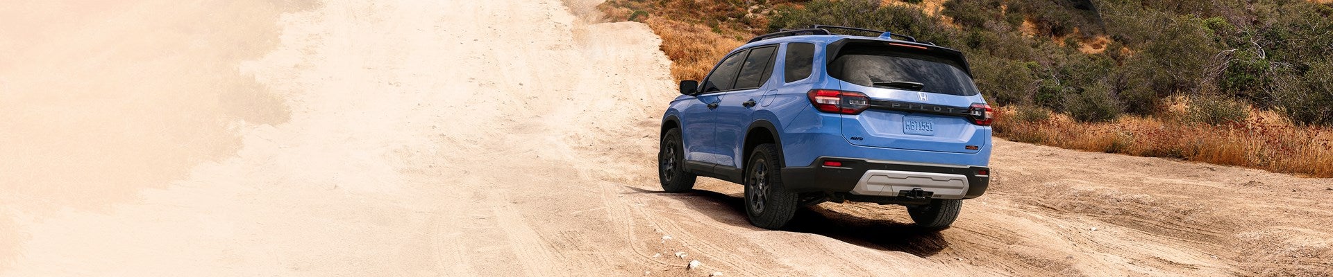 2025 Honda Pilot on Dirt Road